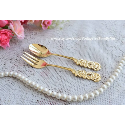 Vintage style dinner spoon and fork set with rose decoration