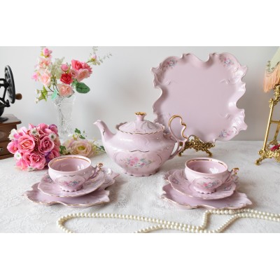 Pink porcelain tea set for two with cake plate