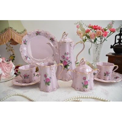 Pink porcelain coffee set for two with cake plate