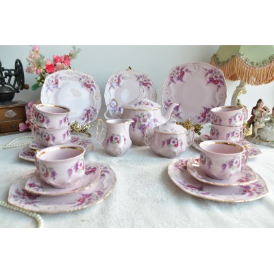 Pink porcelain tea set for 6 with cake plate