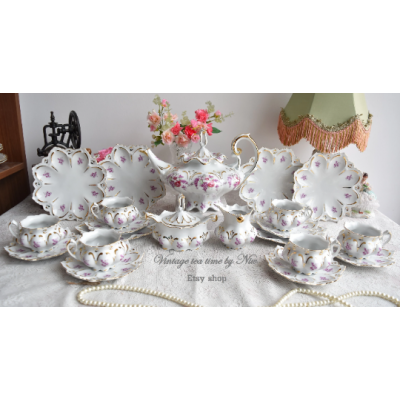 Porcelain tea set for six with puprle flowers