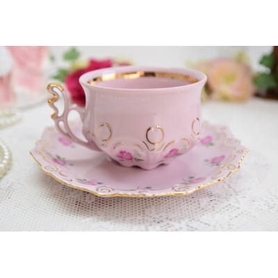 Pink porcelain tea cup with saucer