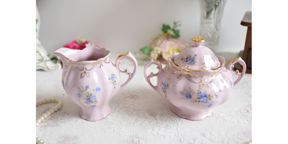 Pink porcelain milk jug and sugar bowl set