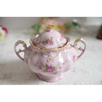 Pink porcelain sugar bowl with pink flowers