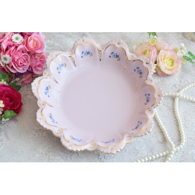 Pink porcelain bowl with blue flowers